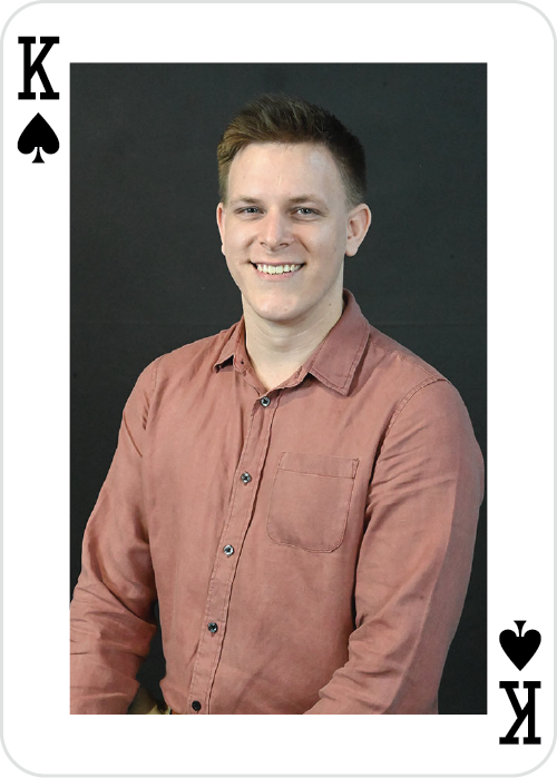 a man smiling at the camera