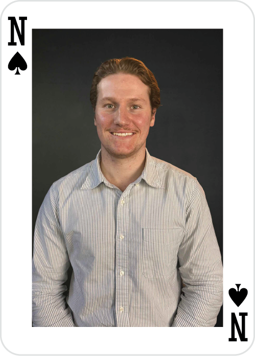 a man smiling at the camera